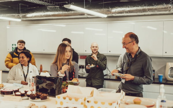 TEDI-London students and staff in campus cafeteria